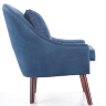 На фото вид сбоку кресла OPALE HALMAR темно-синий